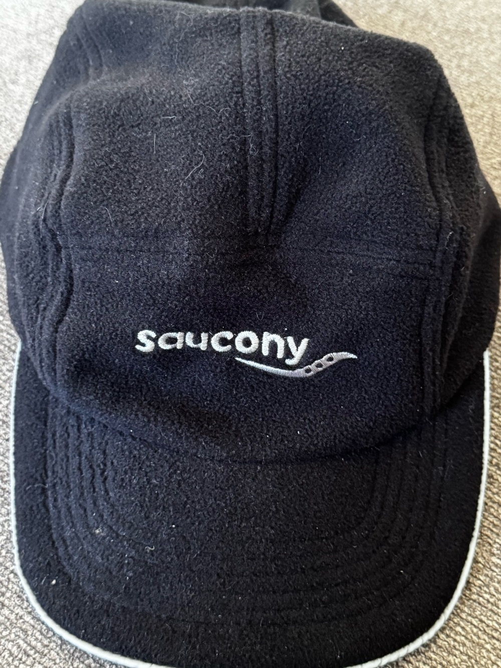 Saucony Black Fleece Running Hat with White Logo